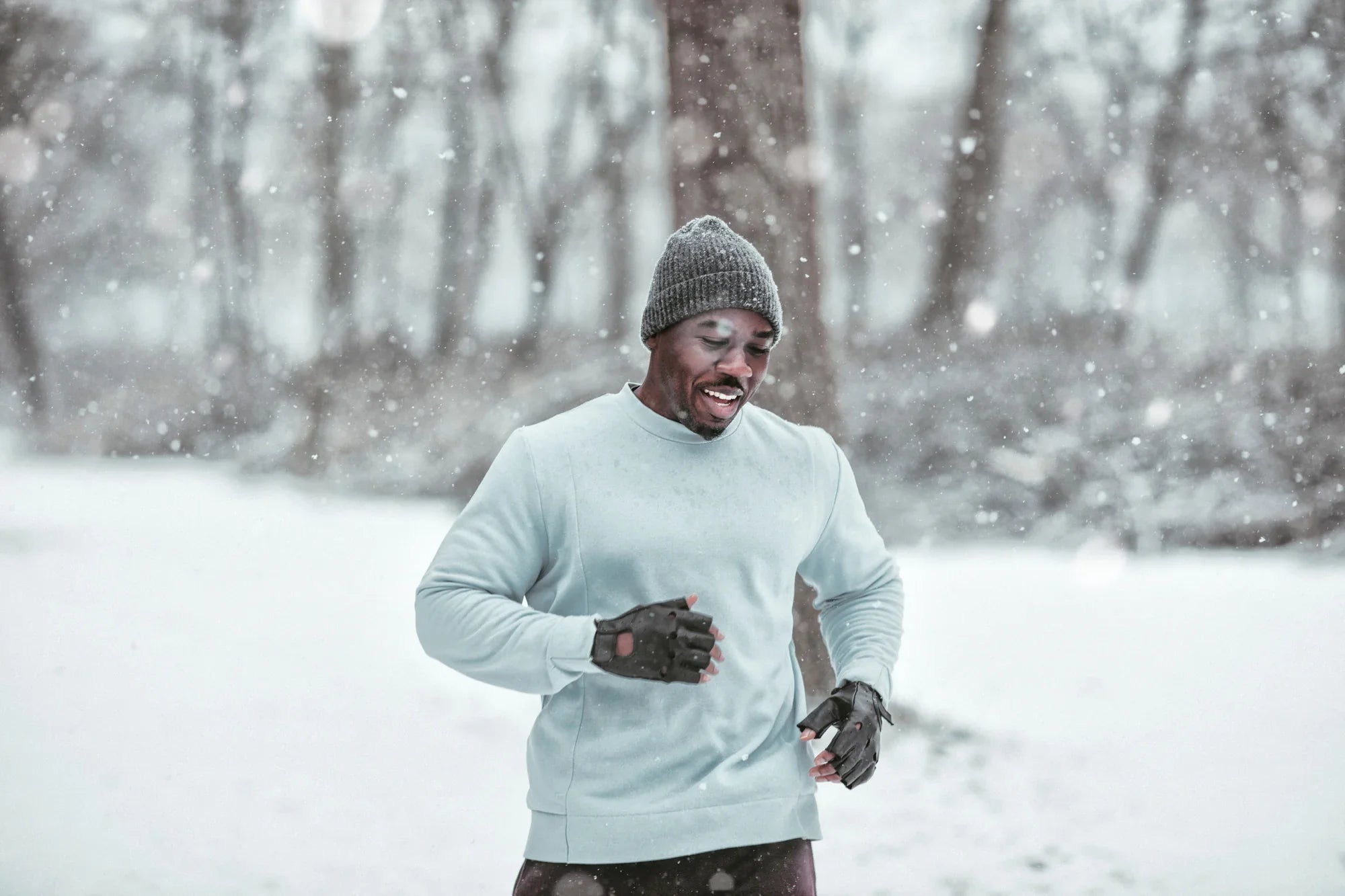 black man running in snow