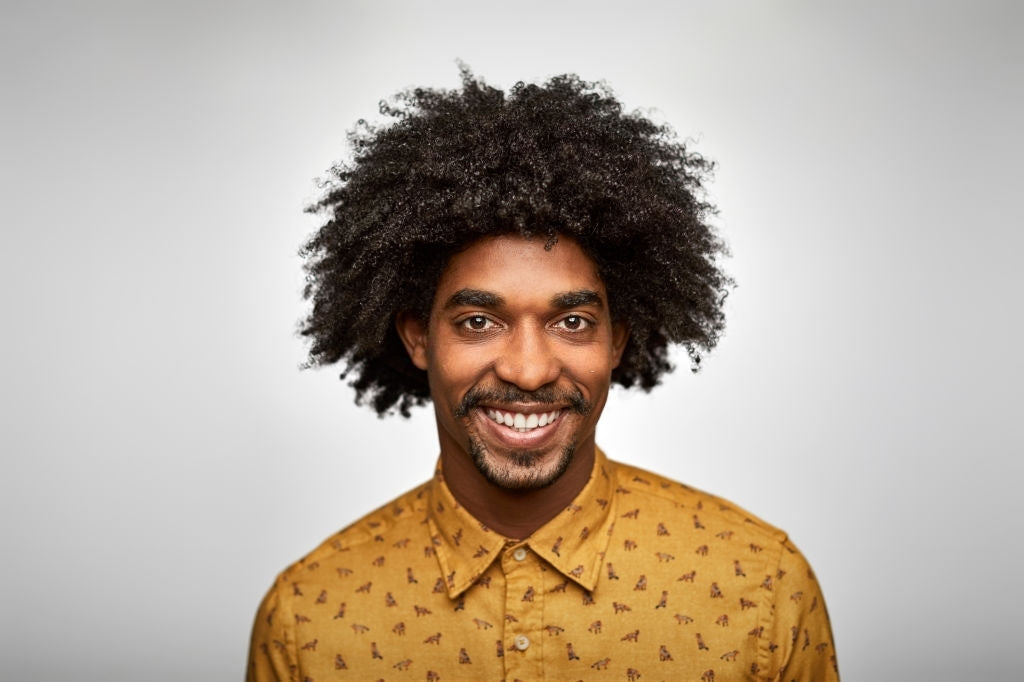 black man with curly and afro hair