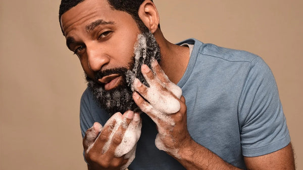 black man washing beard
