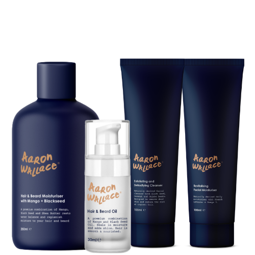 Set of Aaron Wallace skincare and hair care products on a white background
